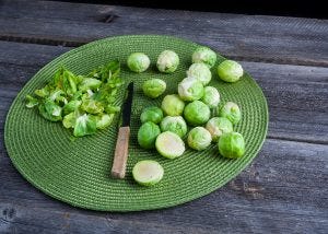 brussels-sprouts-on-wood-table-300x214.jpg
