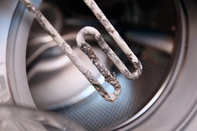 details-closeup-shot-of-electric-heater-from-washing-machine-1-768x512.jpg