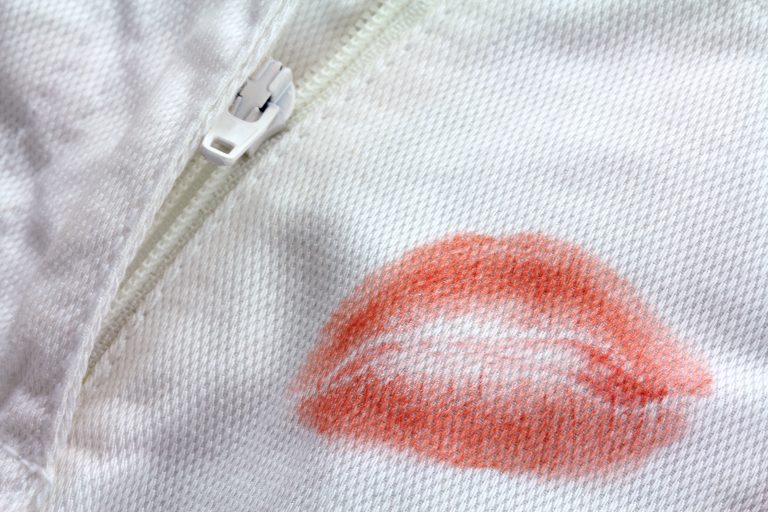 Stain-of-Red-Lipstick-kiss-near-a-zipper-on-a-white-pants-768x512.jpg