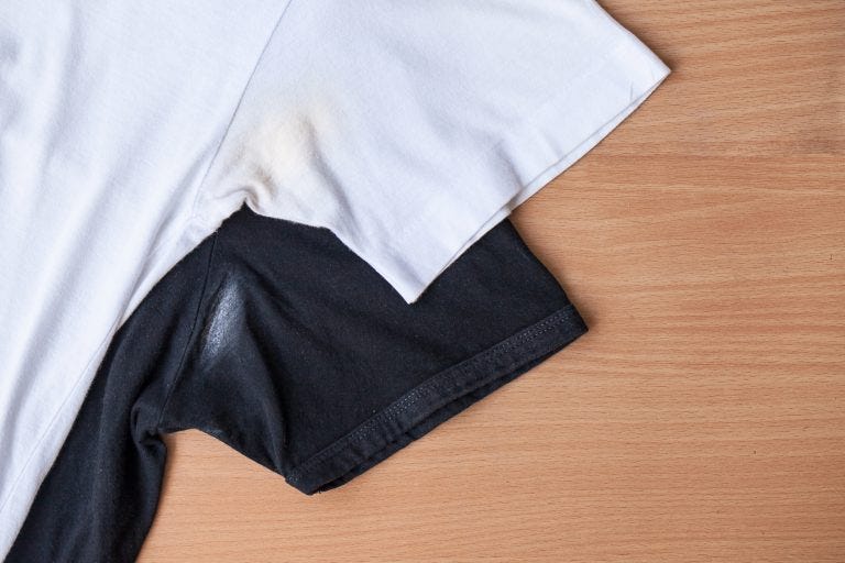 Shirts-dirty-caused-by-roll-on-deodorant-on-wooden-background-768x512.jpg